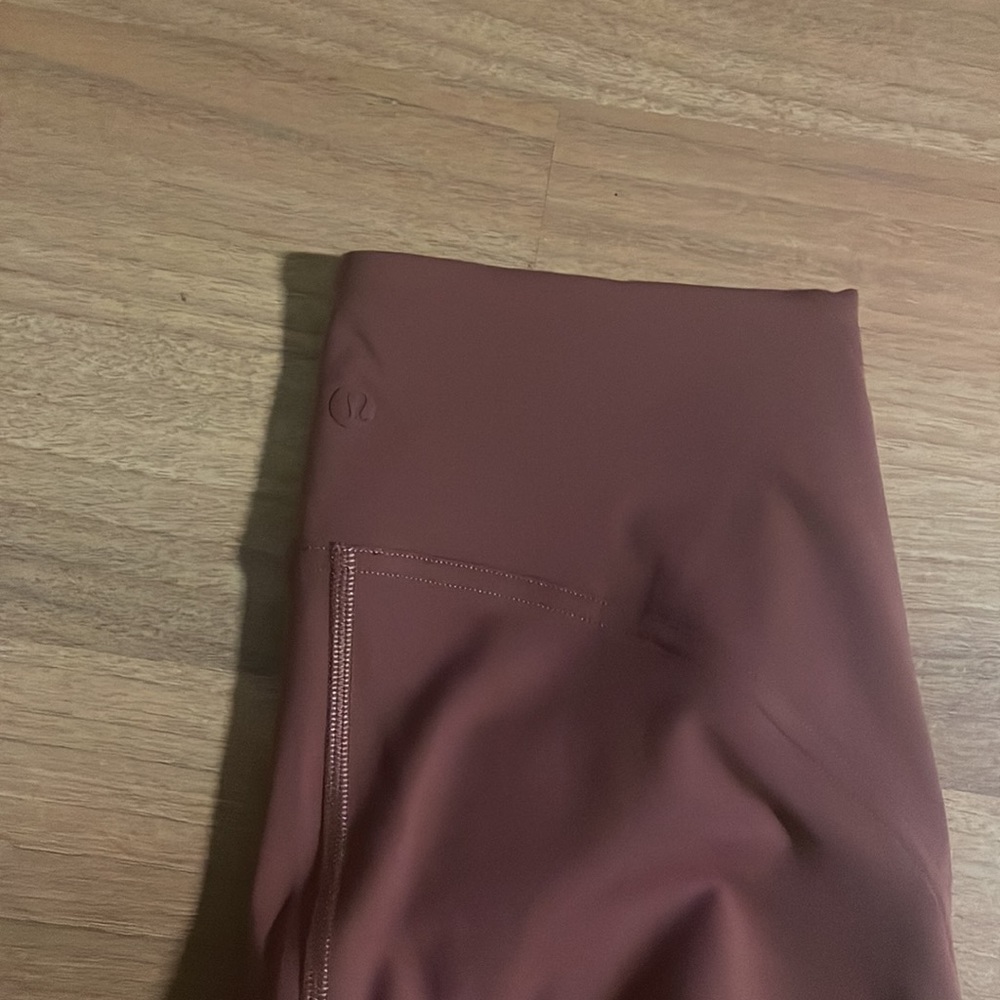 Lululemon mid-rise mulled wine (like a dark pink!) leggings - Picture 2 of 3